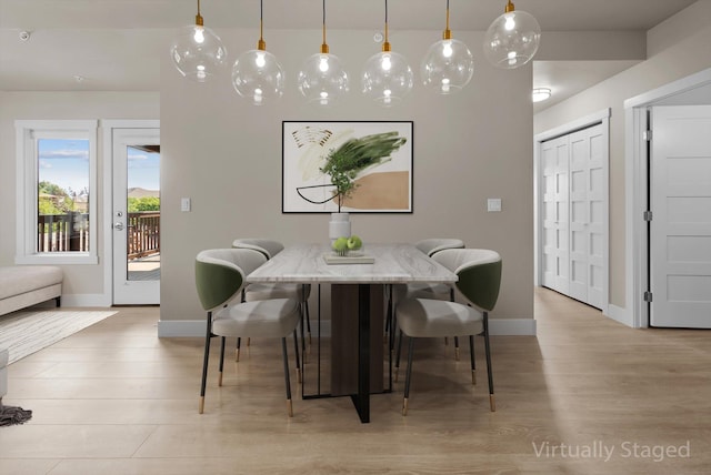 6201 Shiloh Ave Unit G, Whitefish, MT 59937 - dining area featuring light wood-type flooring and baseboards