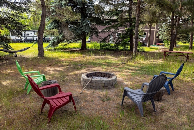 634 Country Way, Kalispell, MT 59901 - view of yard featuring an outdoor fire pit