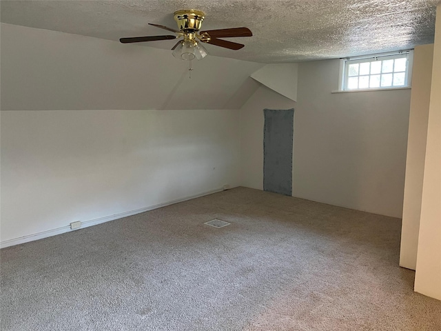 1717 2nd Ave N, Great Falls, MT 59401 - bonus room with carpet, a ceiling fan, a textured ceiling, and vaulted ceiling