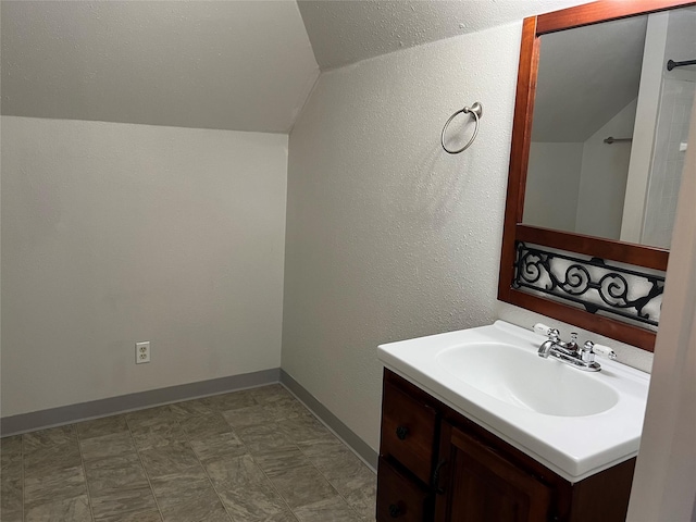 1717 2nd Ave N, Great Falls, MT 59401 - bathroom featuring vaulted ceiling and vanity