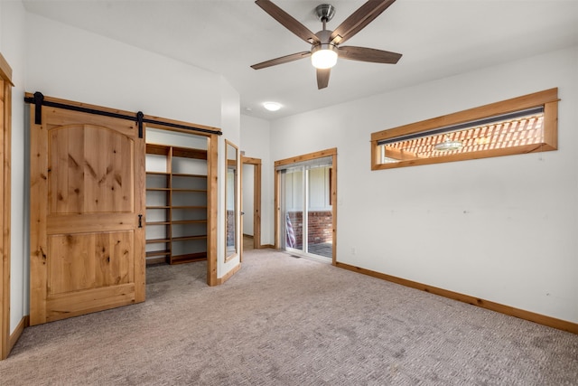 2206 US Highway 2 W, Kalispell, MT 59901 - unfurnished bedroom with carpet and a ceiling fan
