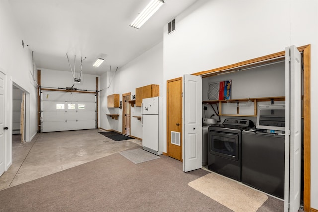 2206 US Highway 2 W, Kalispell, MT 59901 - garage with freestanding refrigerator and independent washer and dryer