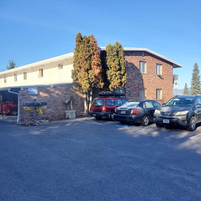 701 39th St, Missoula, MT 59803 - view of property with uncovered parking