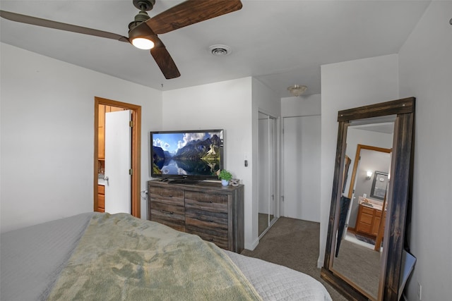 2321 8th Ave S, Great Falls, MT 59405 - bedroom featuring dark colored carpet, ensuite bathroom, and ceiling fan