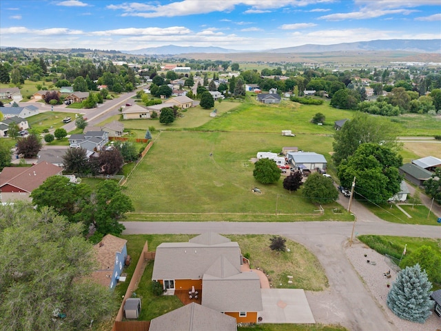 1503 5th St E, Polson, MT 59860 - aerial view of residential area with a mountainous background