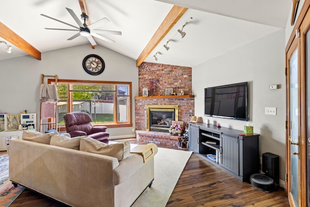 2604 5th Ave S, Great Falls, MT 59405 - living area with dark wood finished floors, ceiling fan, track lighting, and a fireplace