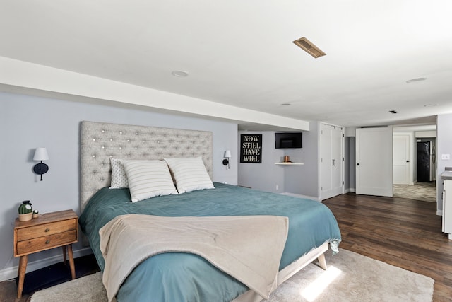2604 5th Ave S, Great Falls, MT 59405 - bedroom with dark wood-style floors and freestanding refrigerator