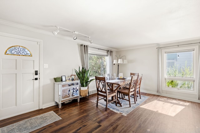 2604 5th Ave S, Great Falls, MT 59405 - dining room with wood finished floors, crown molding, and rail lighting