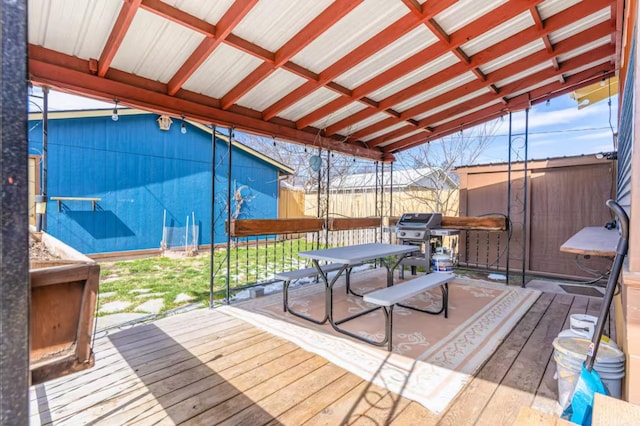 1046 3rd Ave E, Kalispell, MT 59901 - wooden deck featuring area for grilling and outdoor dining space