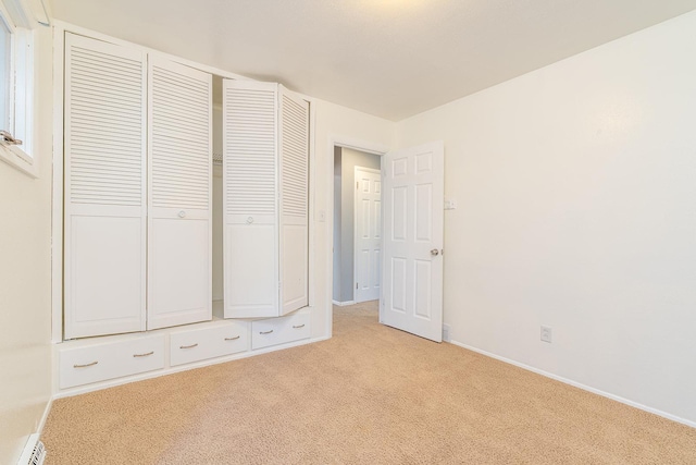 408 23rd Ave NE, Great Falls, MT 59404 - unfurnished bedroom featuring light colored carpet and a closet