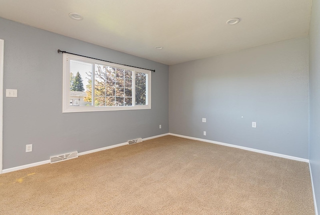 408 23rd Ave NE, Great Falls, MT 59404 - spare room with carpet and recessed lighting