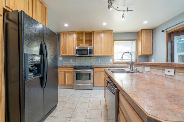 408 23rd Ave NE, Great Falls, MT 59404 - kitchen featuring appliances with stainless steel finishes, plenty of natural light, light tile patterned floors, open shelves, and recessed lighting