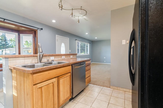 408 23rd Ave NE, Great Falls, MT 59404 - kitchen with freestanding refrigerator, dishwasher, light tile patterned floors, light colored carpet, and recessed lighting