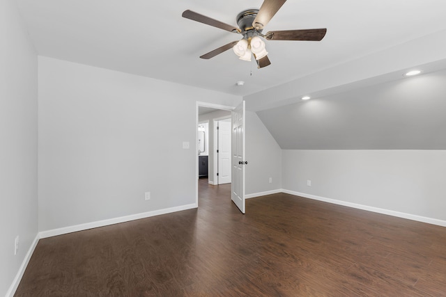 bonus room featuring ceiling fan, lofted ceiling, and dark wood-type flooring