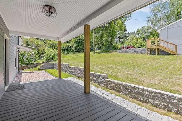 wooden deck with a yard