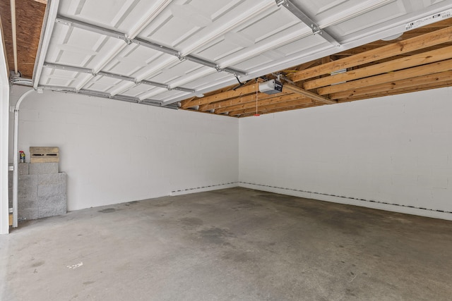 garage featuring a garage door opener