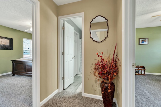 2506 Cindy St, Athens, TN 37303 - hallway featuring carpet, a textured ceiling, and baseboards