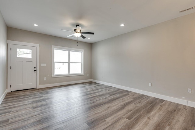 foyer entrance featuring ceiling fan and light hardwood / wood-style floors