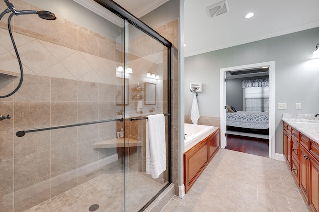 ensuite bathroom featuring a shower stall, crown molding, ensuite bathroom, recessed lighting, and vanity
