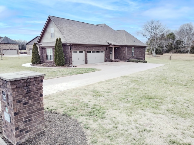 view of front of home featuring an attached garage, a front lawn, concrete driveway, and roof with shingles