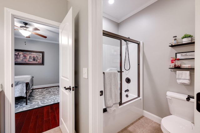 bathroom with ornamental molding, wood finished floors, double vanity, and a sink