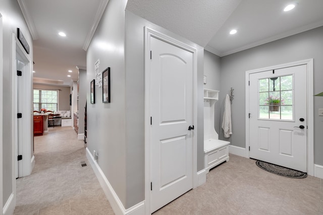 interior space featuring recessed lighting, light tile patterned floors, and ornamental molding