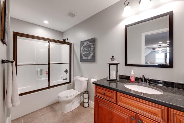 bathroom featuring visible vents, baseboards, toilet, tile patterned floors, and vanity