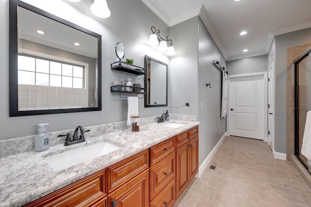 full bathroom featuring recessed lighting, ornamental molding, a sink, baseboards, and a stall shower