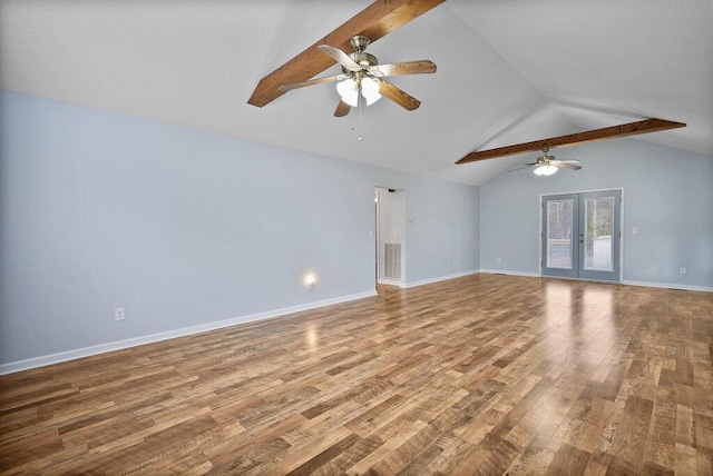 spare room featuring wood finished floors, baseboards, visible vents, vaulted ceiling with beams, and french doors