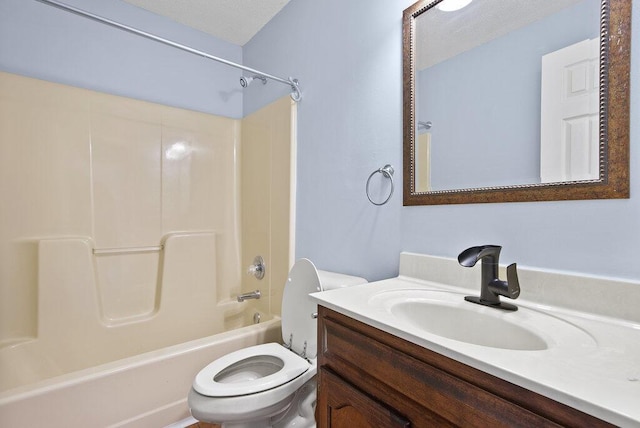 bathroom featuring shower / bath combination, toilet, and vanity