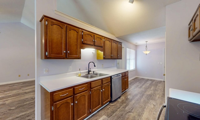 519 Cedar Glen Cir, Chattanooga, TN 37412 - kitchen featuring stainless steel dishwasher, a sink, wood finished floors, light countertops, and baseboards