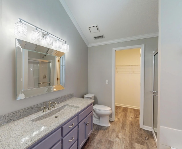 519 Cedar Glen Cir, Chattanooga, TN 37412 - full bathroom with crown molding, a stall shower, wood finished floors, toilet, and vanity