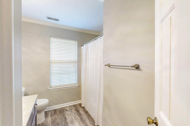 519 Cedar Glen Cir, Chattanooga, TN 37412 - full bathroom featuring wood finished floors, toilet, vanity, baseboards, and ornamental molding