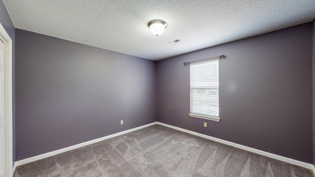 519 Cedar Glen Cir, Chattanooga, TN 37412 - empty room with carpet, a textured ceiling, and baseboards