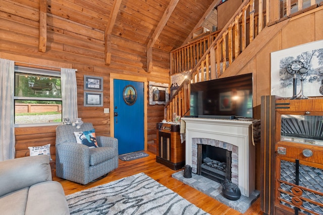 144 Low Brook Ct NE, Cleveland, TN 37312 - living area featuring stairs, wood ceiling, wood finished floors, and a fireplace with raised hearth
