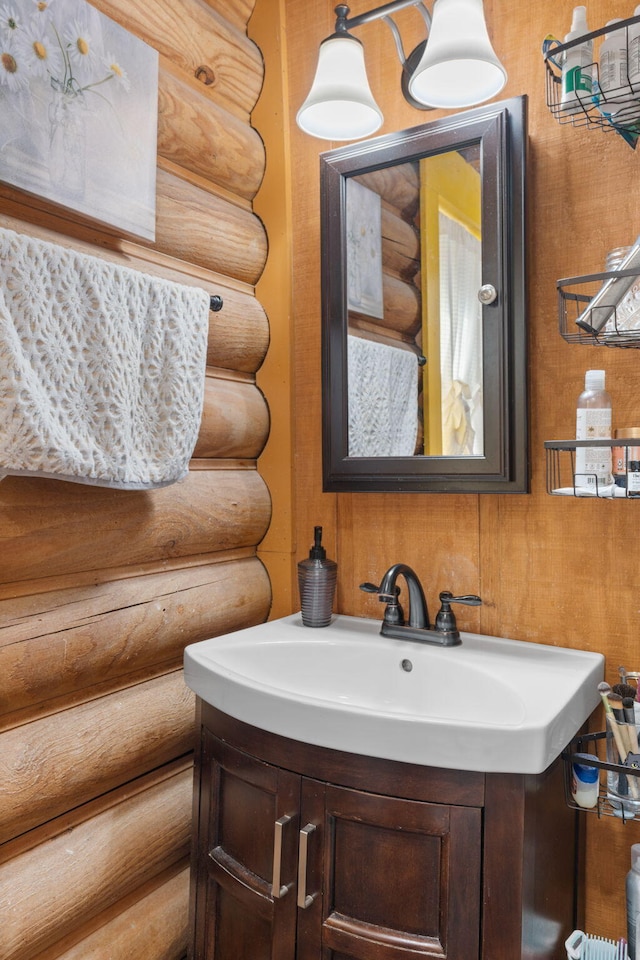 144 Low Brook Ct NE, Cleveland, TN 37312 - bathroom with vanity and log walls