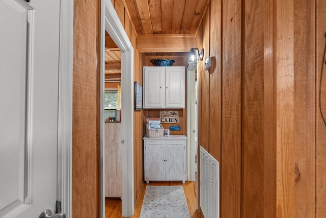 144 Low Brook Ct NE, Cleveland, TN 37312 - corridor featuring wooden ceiling, wooden walls, and light wood finished floors