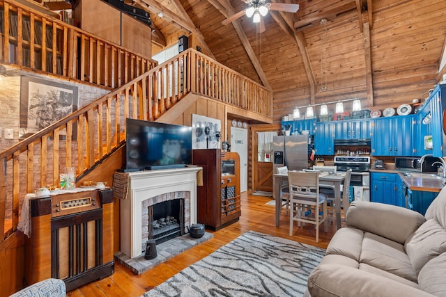 144 Low Brook Ct NE, Cleveland, TN 37312 - living room featuring a wood ceiling with exposed beams, high vaulted ceiling, light wood-style flooring, stairway, and a ceiling fan