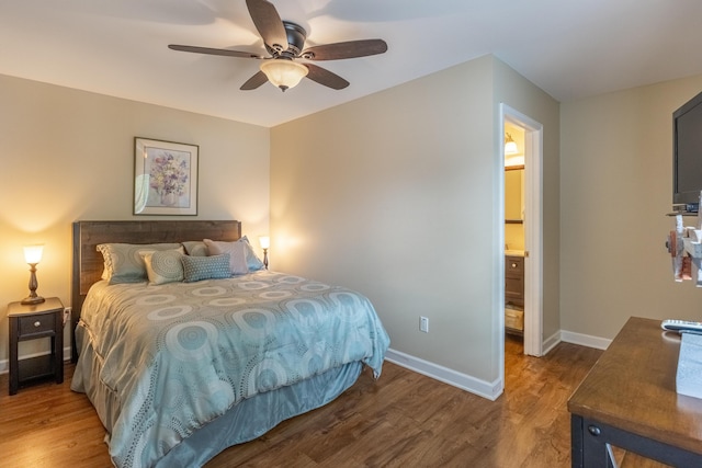 bedroom with ceiling fan, dark hardwood / wood-style floors, and ensuite bathroom