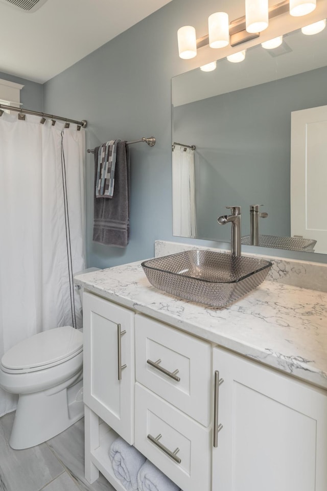 114 Monroe Dr, Ringgold, GA 30736 - full bath featuring vanity and toilet