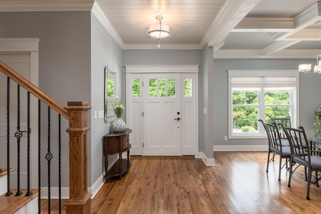 114 Monroe Dr, Ringgold, GA 30736 - foyer with crown molding, baseboards, wood finished floors, stairway, and a chandelier