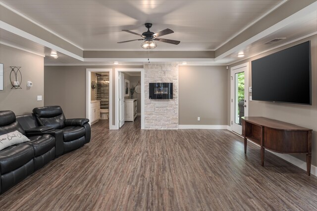 114 Monroe Dr, Ringgold, GA 30736 - living area featuring a raised ceiling, ceiling fan, dark wood finished floors, a fireplace, and crown molding