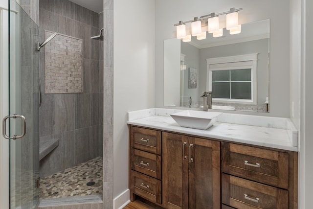 114 Monroe Dr, Ringgold, GA 30736 - bathroom featuring a shower stall, vanity, and ornamental molding