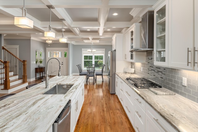 114 Monroe Dr, Ringgold, GA 30736 - kitchen featuring a sink, stainless steel appliances, wall chimney range hood, light wood-style floors, and recessed lighting