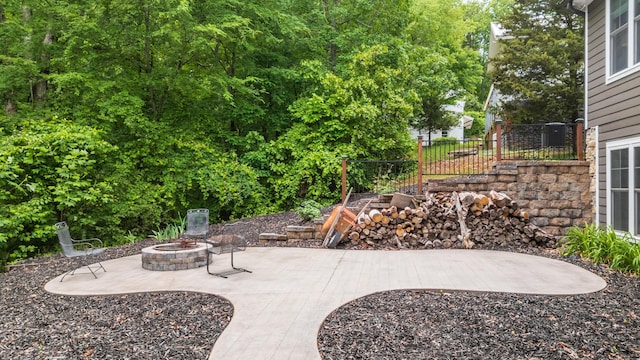 114 Monroe Dr, Ringgold, GA 30736 - view of yard featuring a fire pit, a patio, and fence