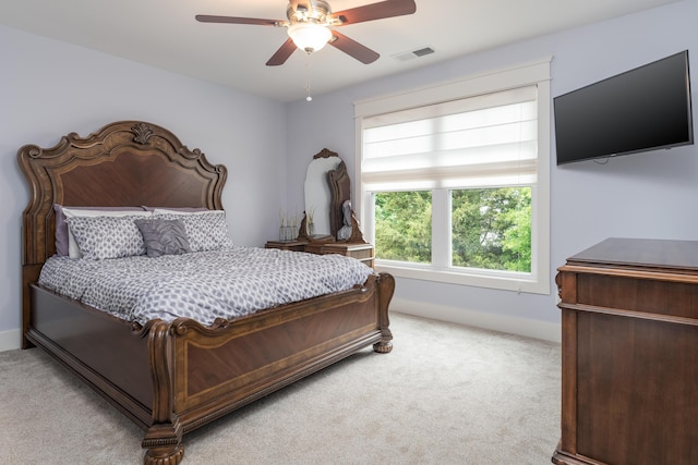 114 Monroe Dr, Ringgold, GA 30736 - bedroom featuring light carpet, baseboards, and a ceiling fan