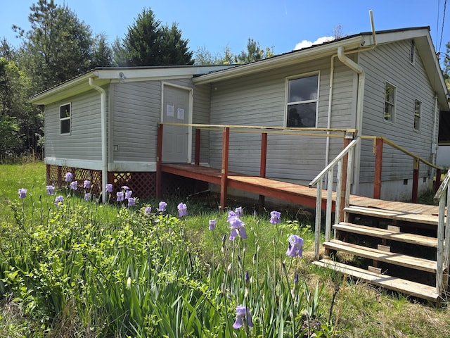 138 Singo Dr, Turtletown, TN 37391 - back of property with a deck