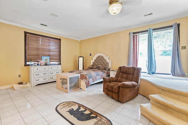 bedroom featuring ceiling fan, light tile patterned floors, and ornamental molding