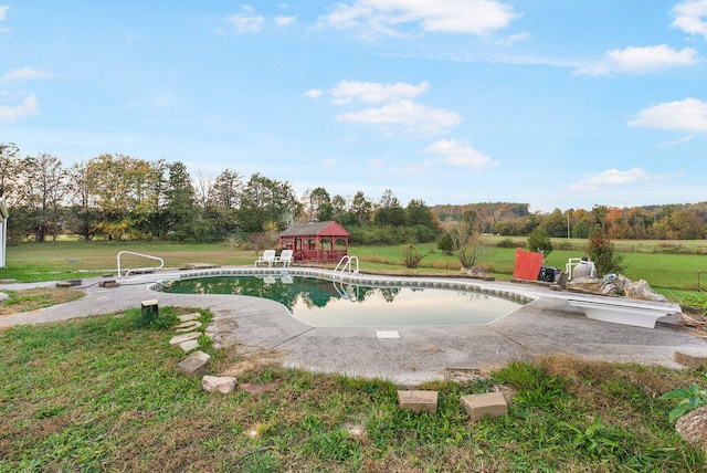 view of pool featuring a gazebo and a yard