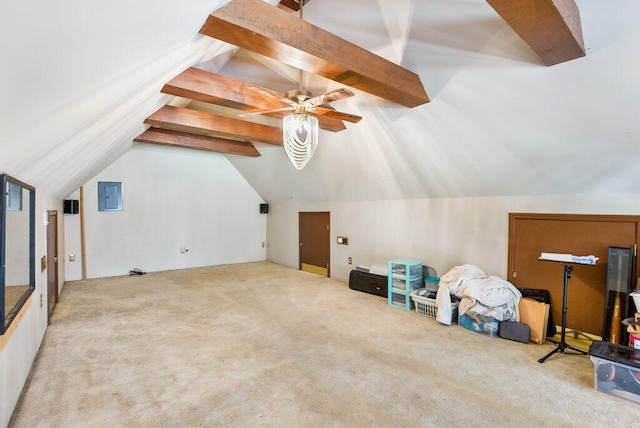 bonus room featuring vaulted ceiling with beams, ceiling fan, and carpet